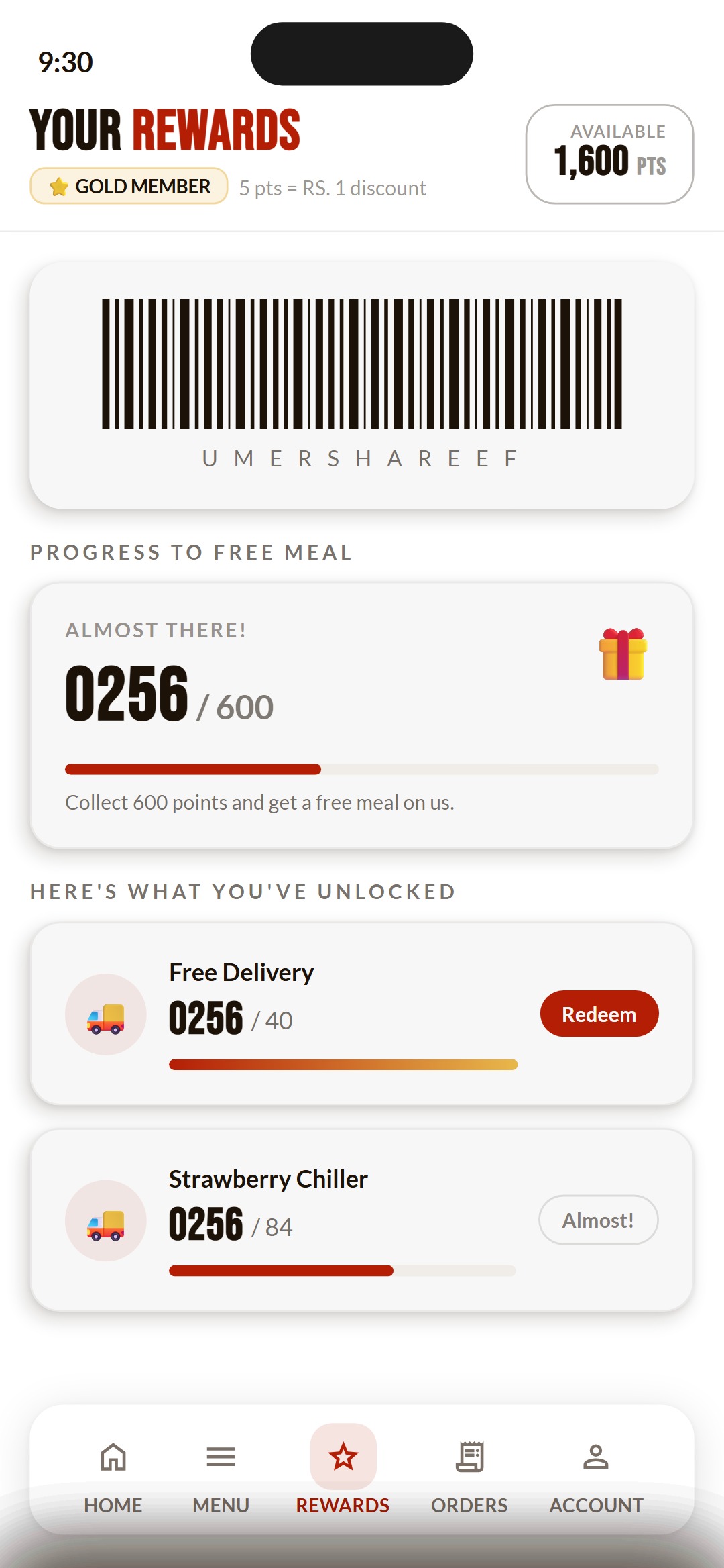 Rewards screen with a gold member badge, a points balance, a scannable loyalty barcode, a progress bar toward a free meal and a list of unlocked rewards with redeem buttons