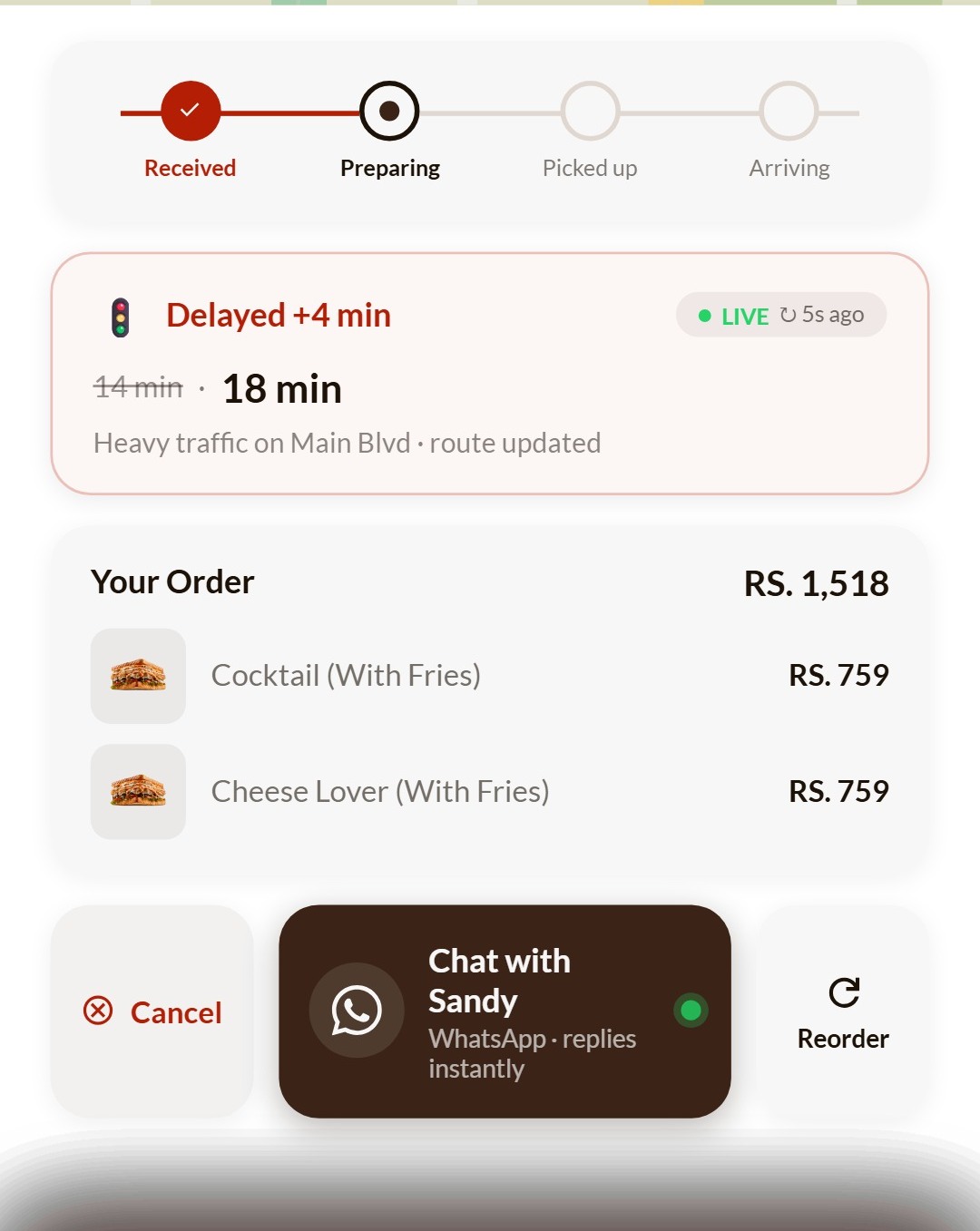 The lower half of the order tracking screen in the app prototype: a four step progress tracker, a delay alert, the order summary, and a Chat with Sandy button sitting between Cancel and Reorder, labelled WhatsApp, replies instantly