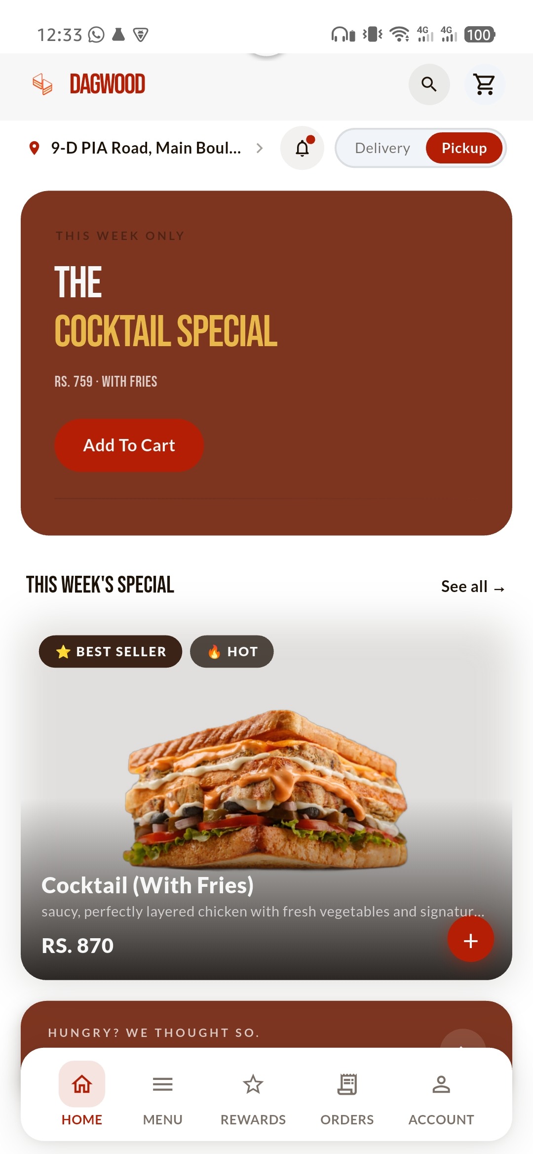 The same home screen in the shipped Dagwood app on Google Play, running on a real Android phone: same hero banner, same featured card and the same five tab navigation, with an Add To Cart button in place of the prototype's Explore Menu